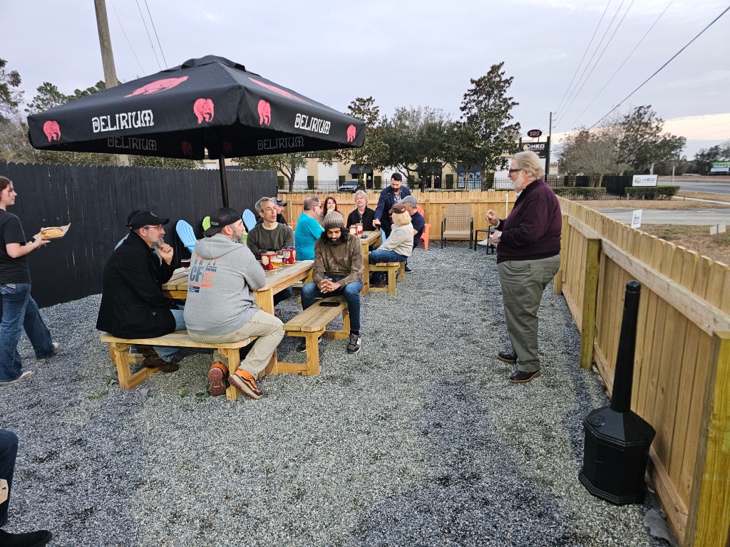 Moby's Beer Club members gathered at the bar